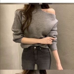 turtleneck shoulder sweater